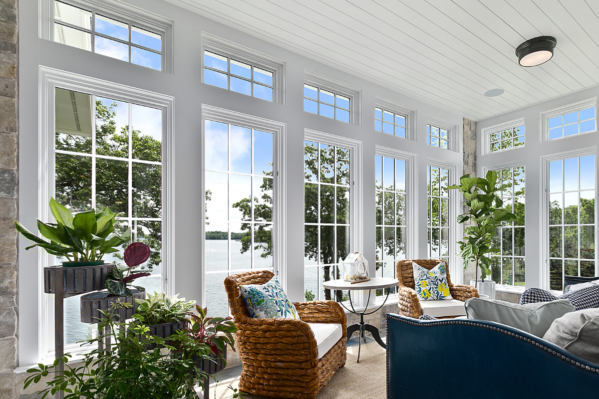 Energy-efficient windows - stock image of a living room with glass windows wall to ceiling